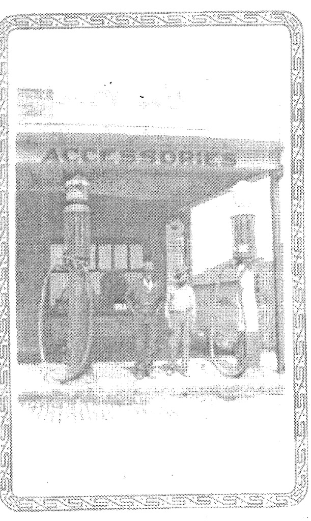 Robert and Charley in front of Dixie Garage