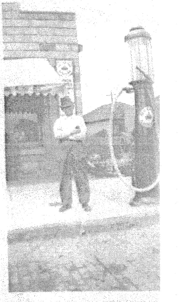 Tom Ball in front of Dixie Garage