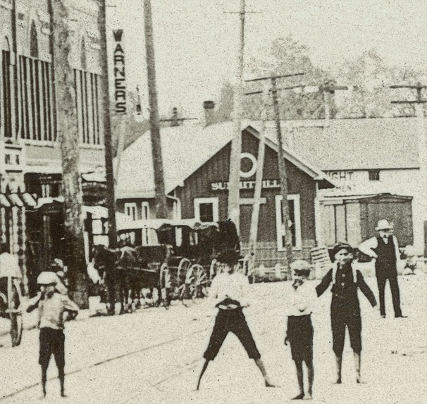 Kids playing in the middle of Main St
